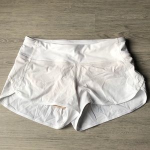 White Lululemon shorts with zipper